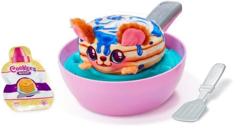 Cookeez Makery Pancake Treatz. Mix & Flip a Plush Best Friend! Place Your Pancake Mix on The Pan and Be Amazed When A Scented, Interactive Plush Friend Flips Out! Styles May Vary